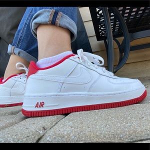 Red trim Nike air force 1’s